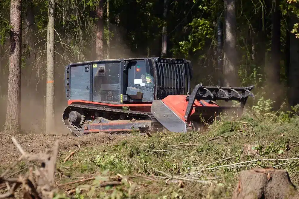 forest mulcher that cleans the soil in the forest. tracked general purpose vehicles used for vegetation and biomass management.